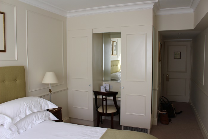 Roomy cupboards, a dressing table and lots of sockets!